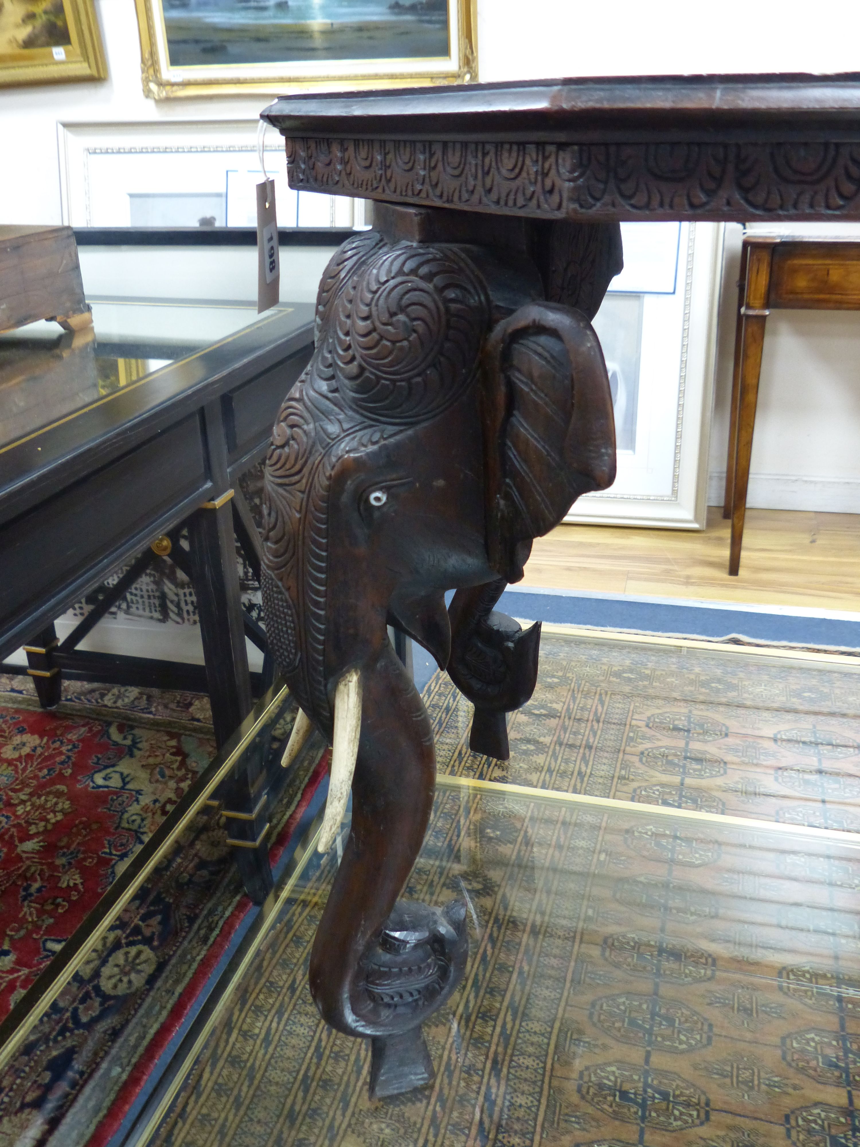 An Indian octagonal carved hardwood occasional table, width 53cm, depth 53cm, height 62cm